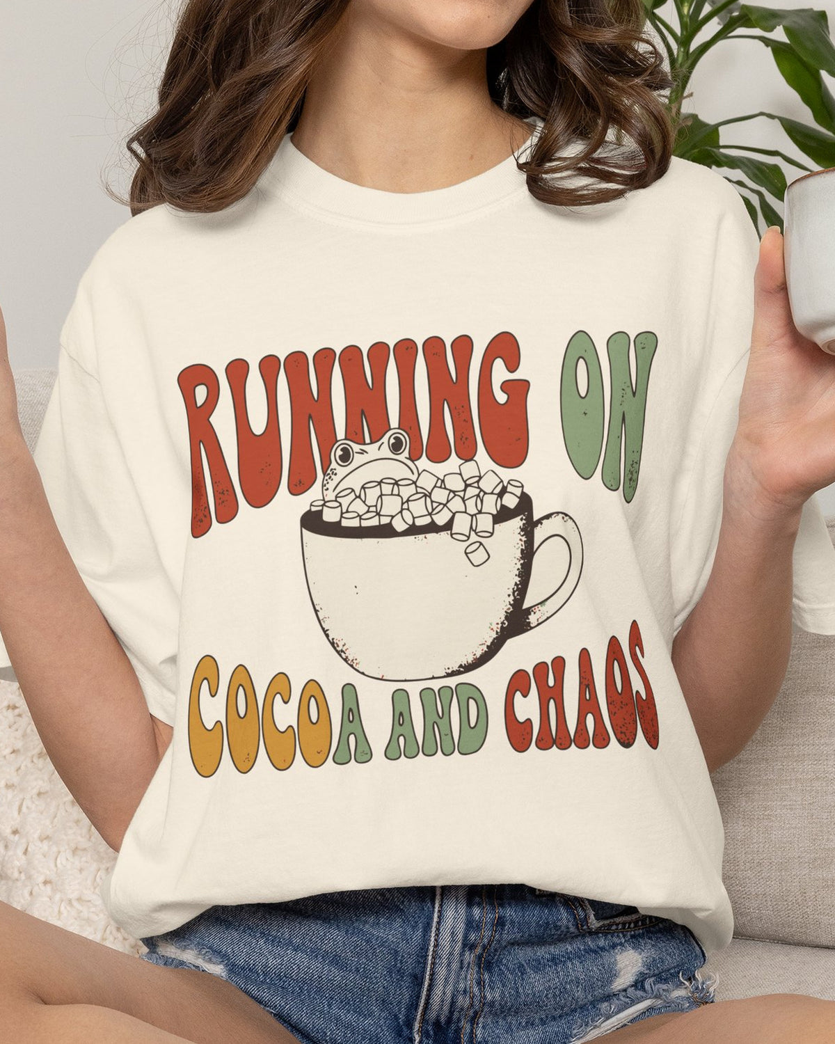 Running On Cocoa And Chaos Shirt, worn by a model