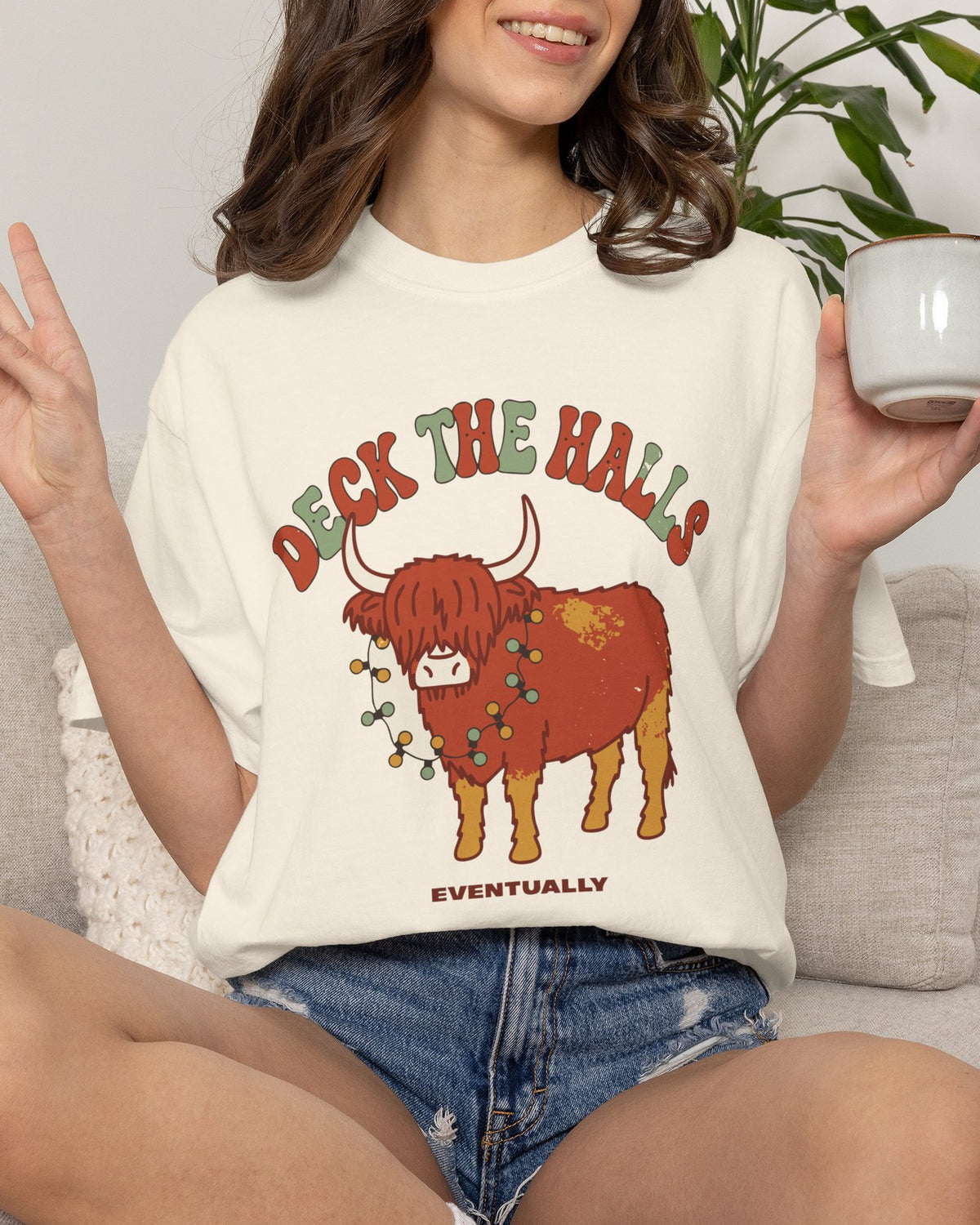 Deck The Halls Eventually Highland Cow Shirt, worn by a model